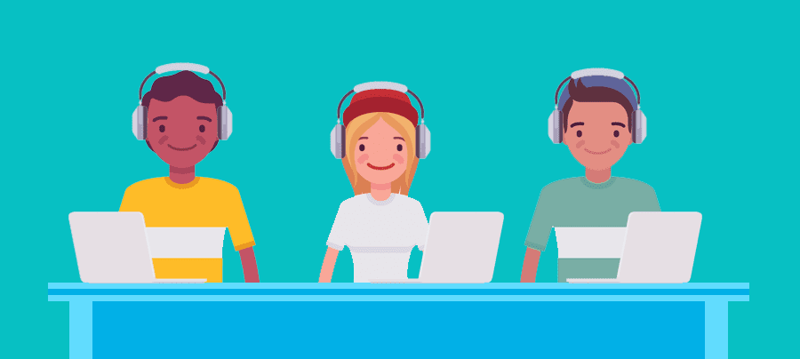 Its-Your-Game-Classroom Image of 2 adolescents, wearing headphones, sitting at a table in front of laptops.
